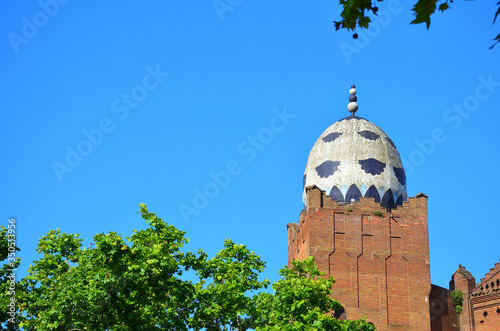 Blue and White Egg Shaped Roof Decoration on a Brick Building in Barcelona, Spain #350513956