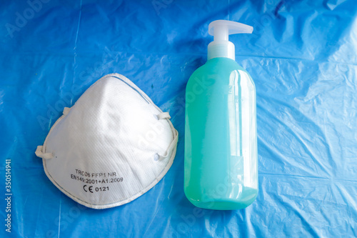 DPI such as gloves and liquid soap to protect ourselves from covid-19 and other infectious diseases photo