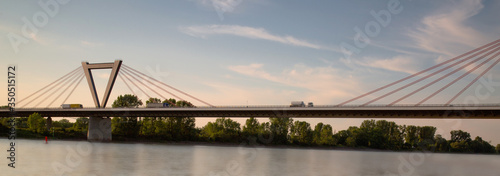 bridge view over the river Rhine in Germany between Düsseldorf and Meerbusch at sunset