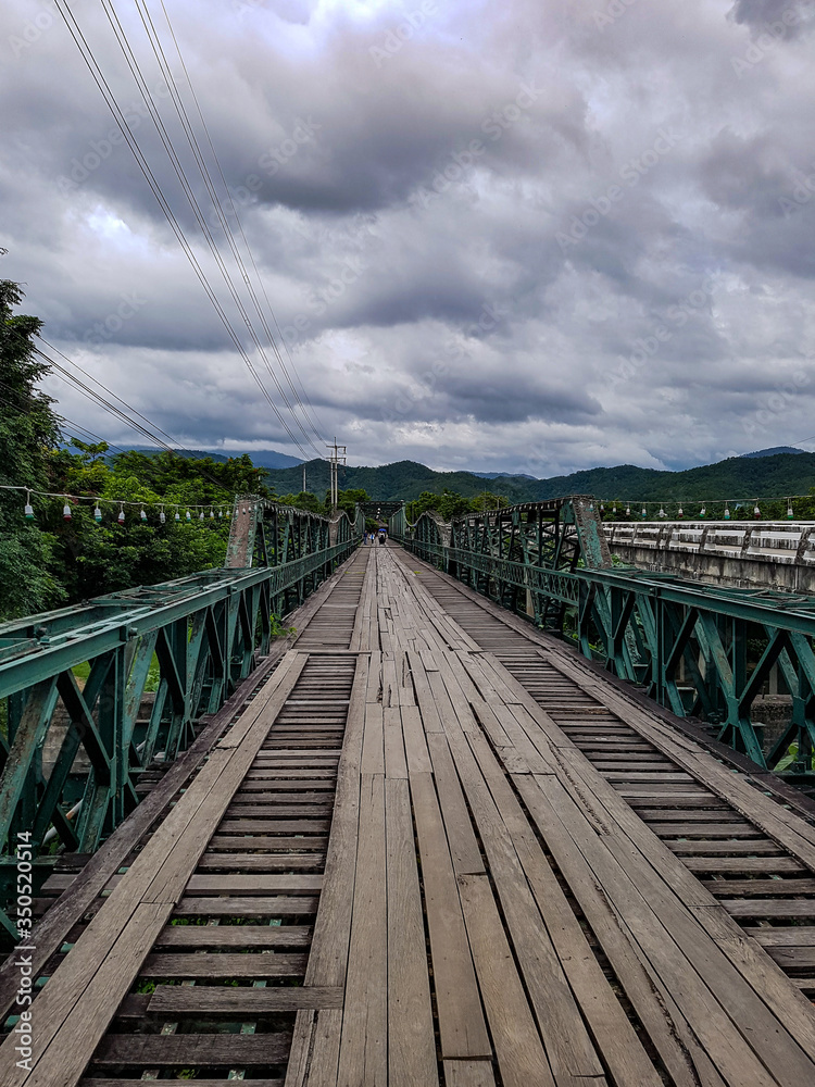 Memorial bridge wwii outside nature village pai river cross wood metall lights chiang mai north thailand forest trees
