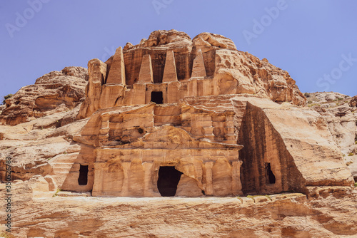 Petra is a big Palace Tomb and the main attraction of Jordan. Petra is included in the UNESCO heritage list. There are Bedouin houses at historical site of Petra, next to the Nabatean theatre, in the 