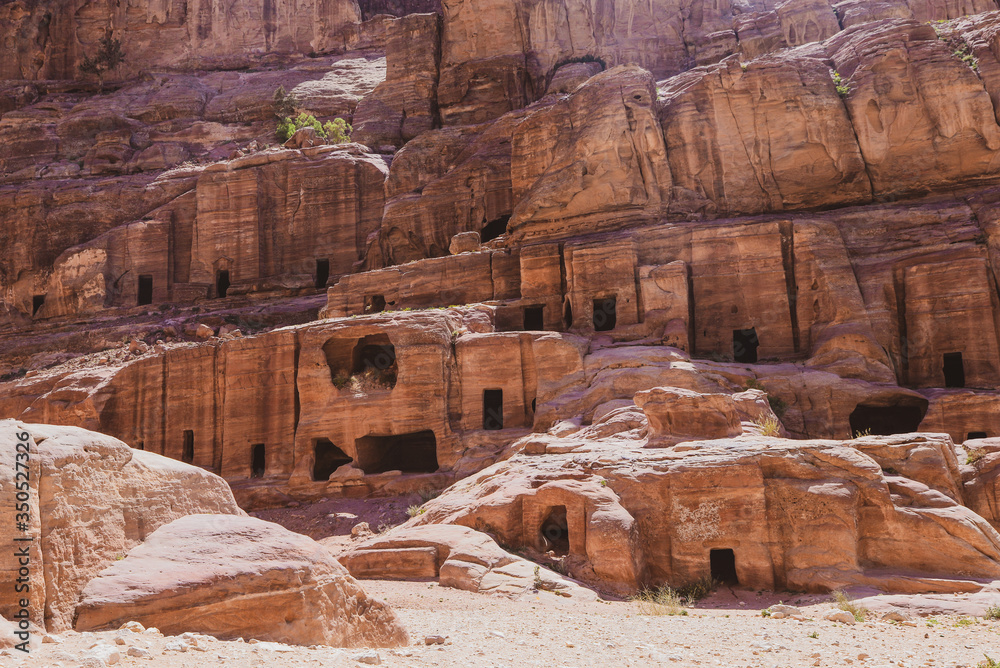Petra is a big Palace Tomb and the main attraction of Jordan. Petra is included in the UNESCO heritage list.
There are Bedouin houses at historical site of Petra, next to the Nabatean theatre, in the 