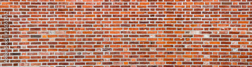 Aged Red Brick Wall texture background. Old stone panoramic background.