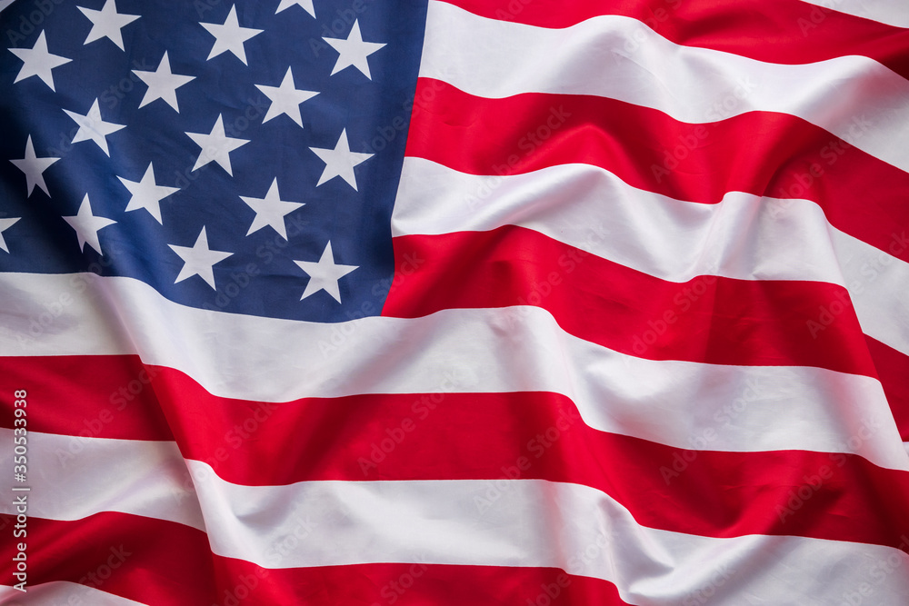 Obraz premium American flag waving. flag of america national on canvas texture background banner for independence day or holiday celebration