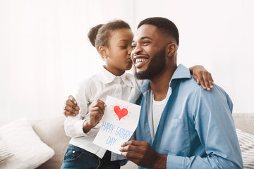 Happy Father's Day. Cute Daughter Kissing Dad In Cheek