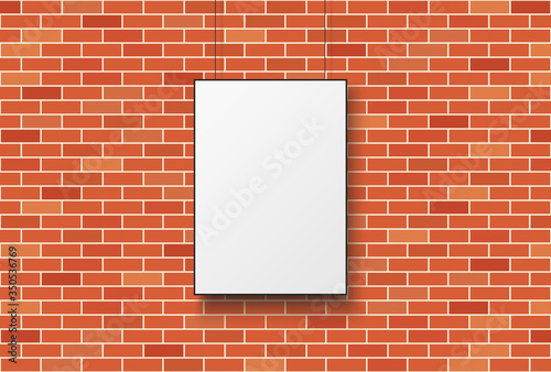 Blank poster on a red brick wall
