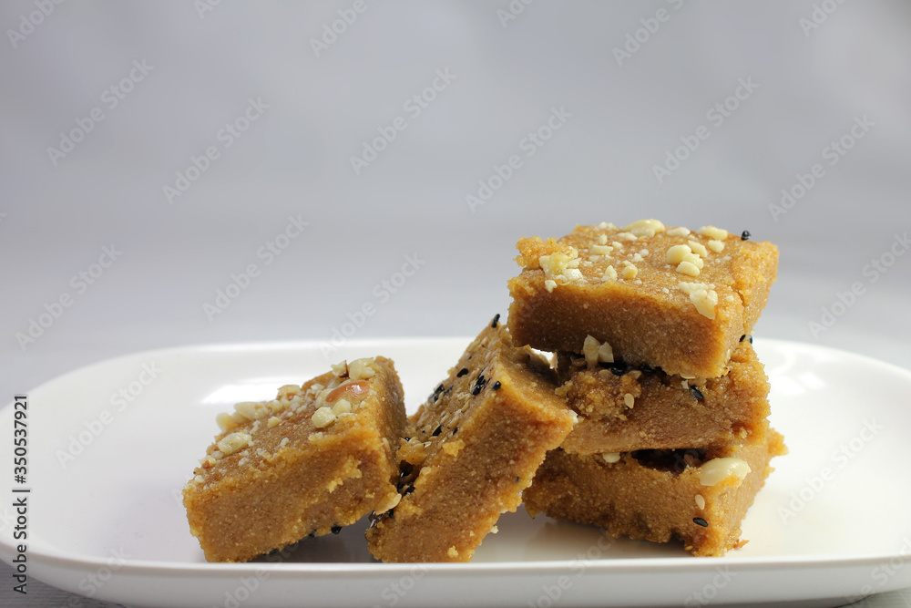 Sukhadi or Gor Papdi is Indian Traditional sweet made with wheat flour