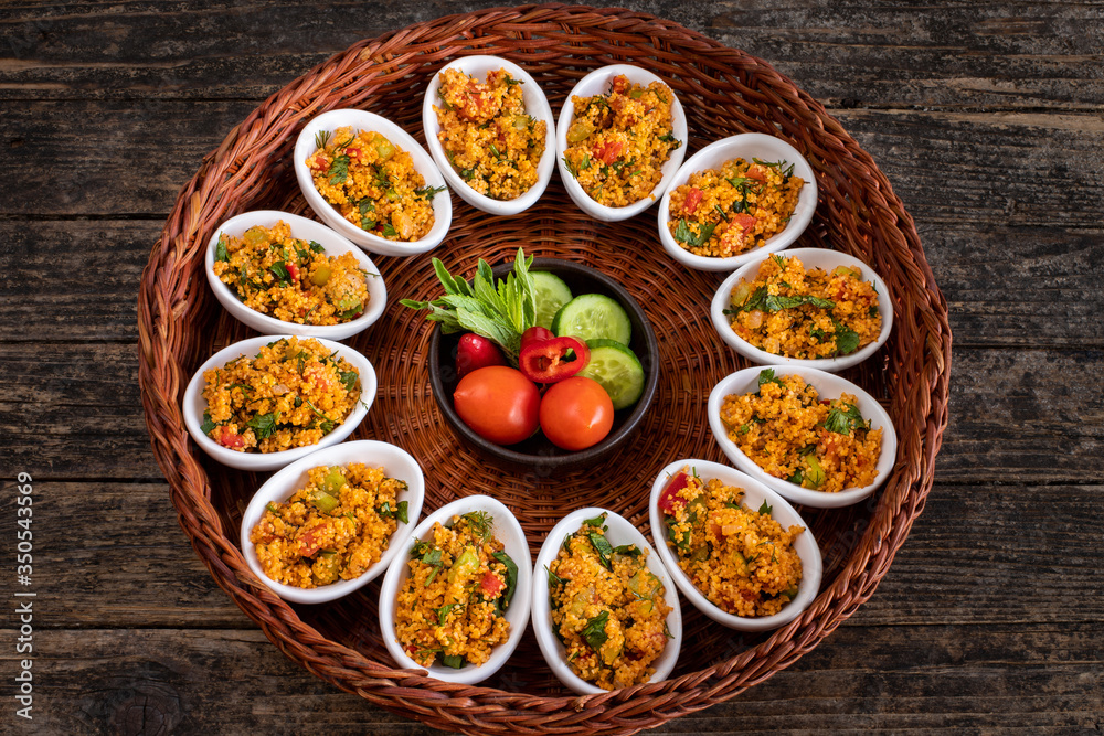 Kısır, a traditional vegan salat prepared from bulgur wheat, tomato, parsley, olive oil and spices
