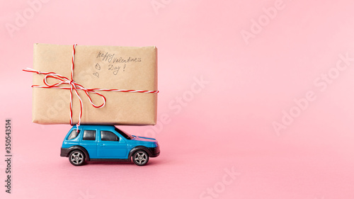 Front view of present on car with copy space for valentines day