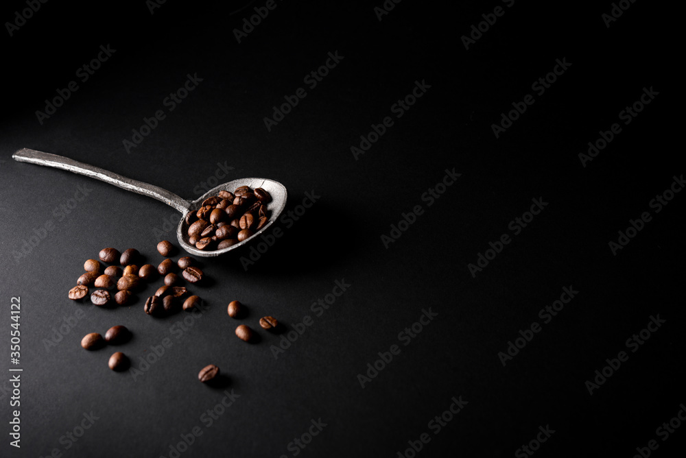 Close-up roasted coffee beans with copy space Close-up roasted coffee beans with copy space