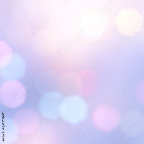 Bokeh abstract pattern on light blue lilac pink gradient background. Holiday blur pattern.