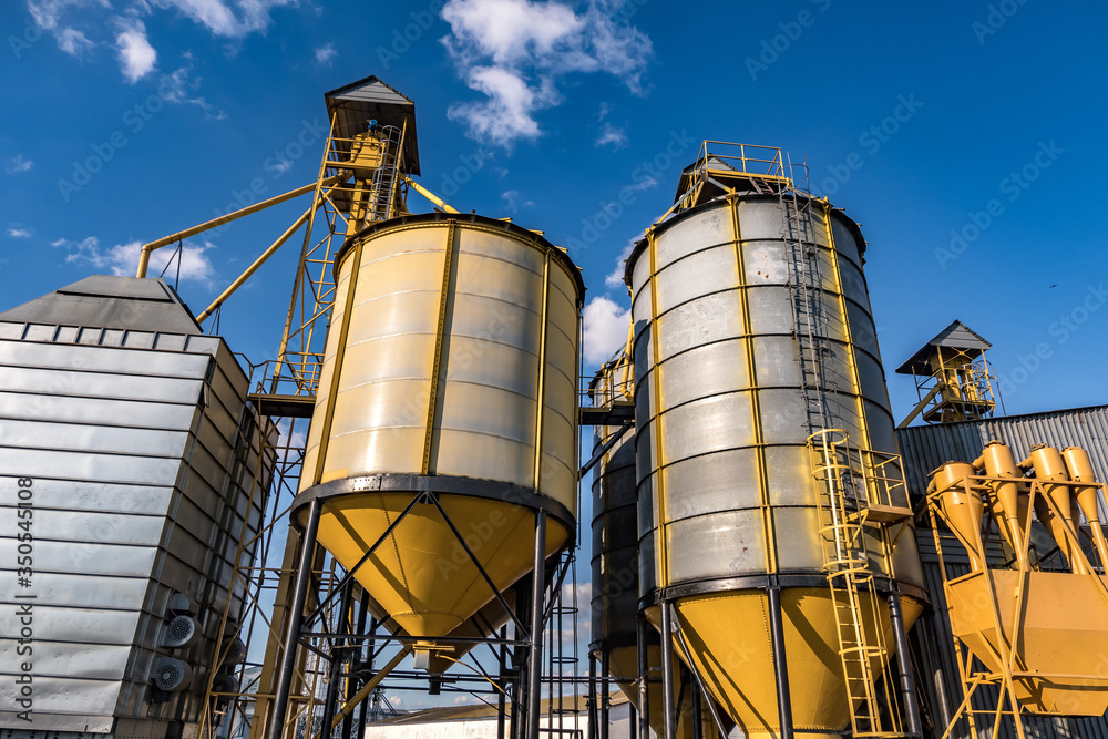 agro-processing and manufacturing plant for processing and silver silos for drying cleaning and storage of agricultural products, flour, cereals and grain. Granary elevator. agro-processing and manufacturing plant for processing and silver silos for drying cleaning and storage of agricultural products, flour, cereals and grain. Granary elevator.