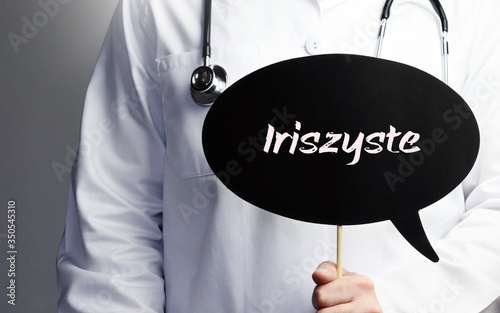 Iriszyste. Arzt mit Stethoskop hält Sprechblase in Hand. Text steht im Schild. Gesundheitswesen, Medizin photo