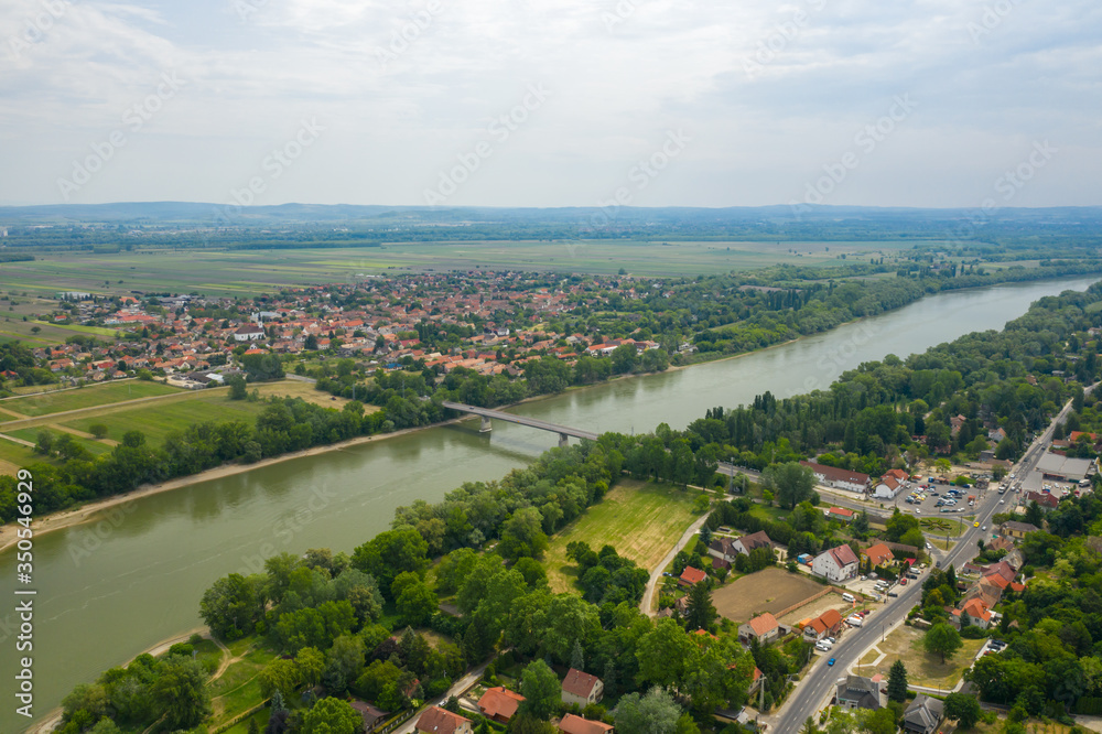 Establishing aerial view of Tahi and Tahitotfalu separated by the Danube river.
