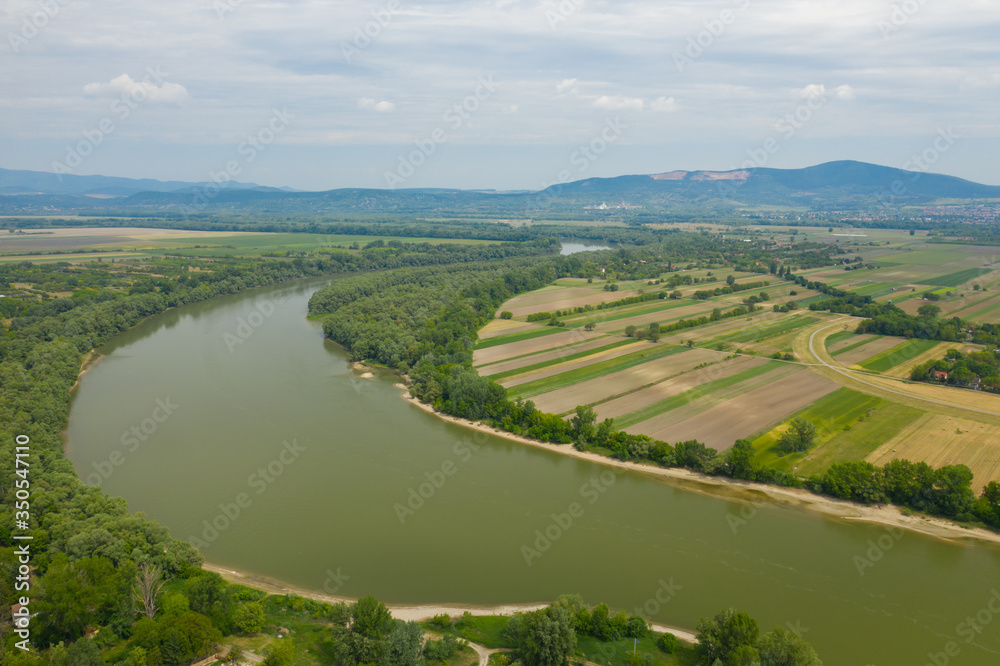Establishing aerial view of Danube river in summer.