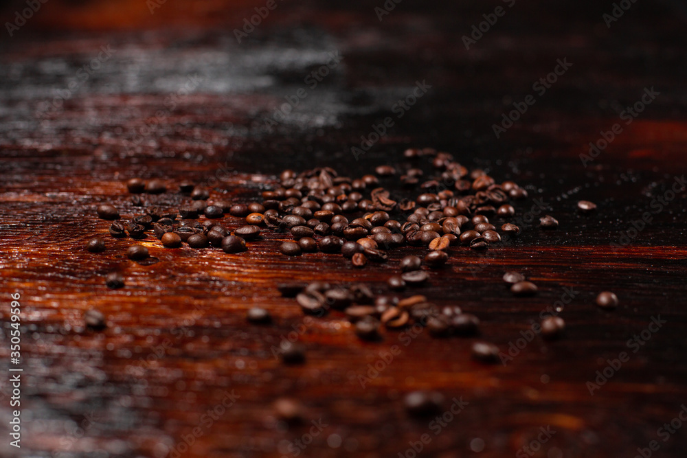 Coffee beans on the wooden table