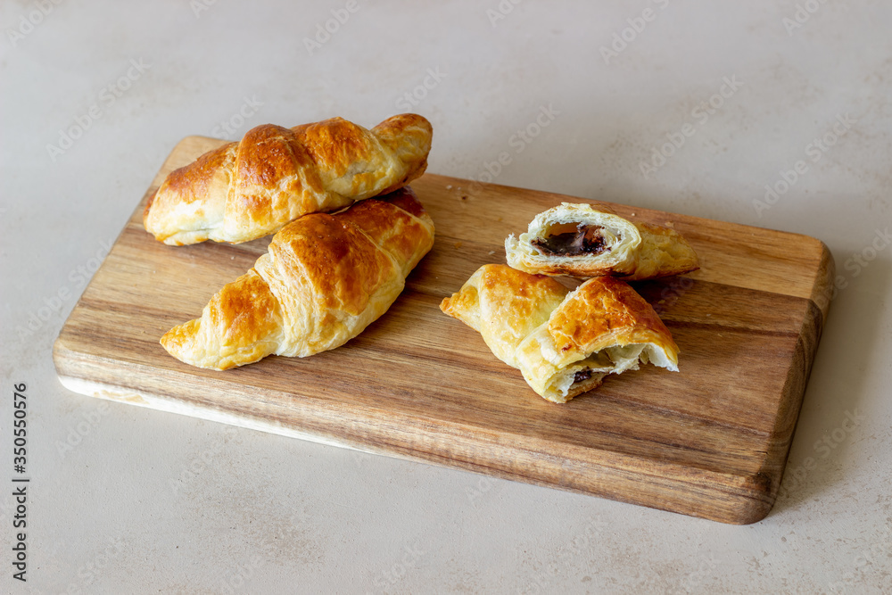 French croissants with chocolate filling. Baking. National cuisine. Breakfast. Vegetarian food. French croissants with chocolate filling. Baking. National cuisine. Breakfast. Vegetarian food.
