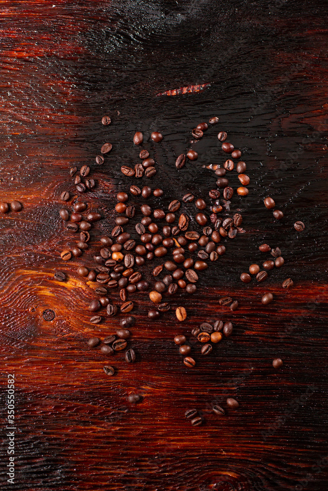 Coffee beans on the wooden table