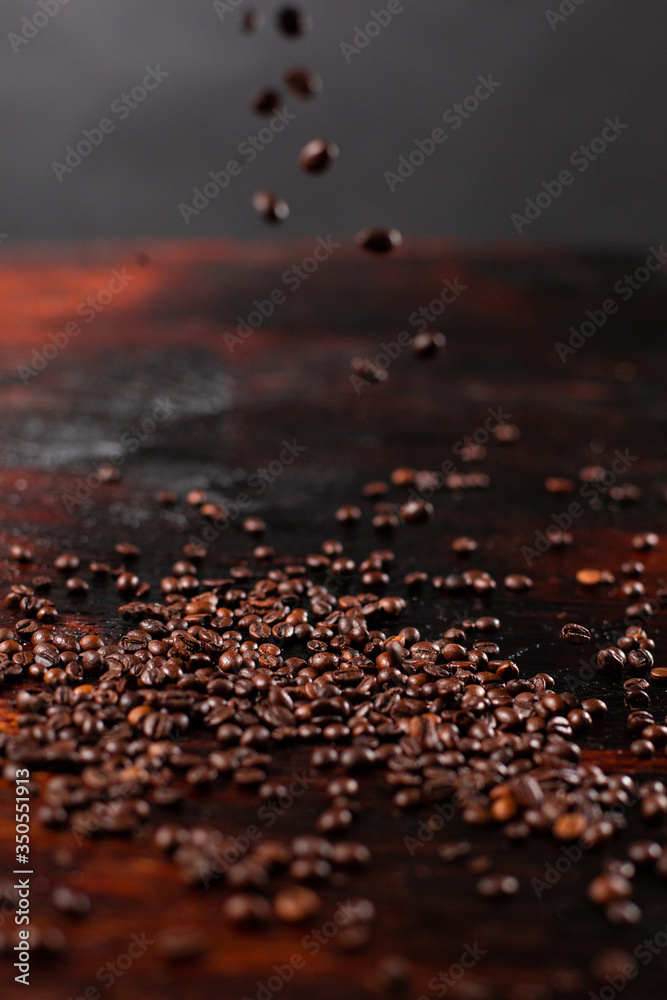 Coffee beans on the wooden table
