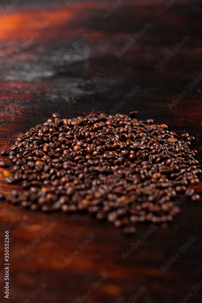 Coffee beans on the wooden table
