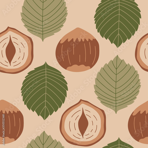 Seamless pattern with hazelnuts and leaves. Healthy diet. Modern background f...