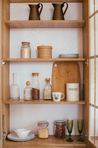 stocked and organiswd kitchen cupboard. cooking from pantry