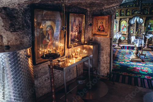 Interior of a cave monastery in Orheiul Vechi natural and historical complex near Trebujeni village, Moldova photo