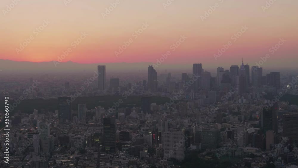 Beatiful orange and red sunset over the Tokyo Cityscape in Japan Beatiful orange and red sunset over the Tokyo Cityscape in Japan