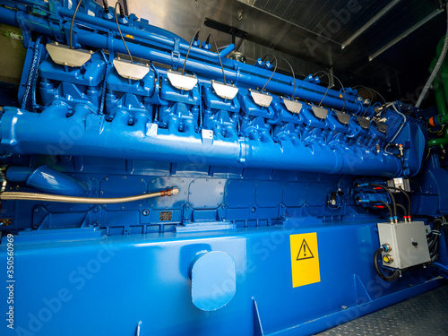 Obraz na płótnie Engine of CHP unit. Diesel and gas industrial electric generator. w salonie