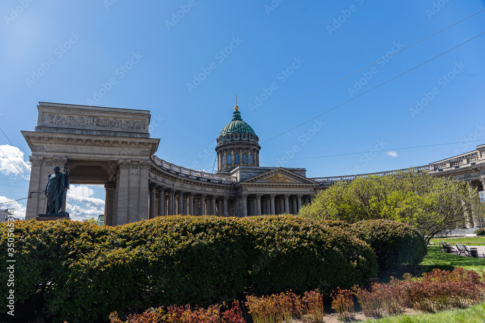 A quiet summer Sunny evening in the Kazan Cathedral in St. Petersburg and lilac bushes.