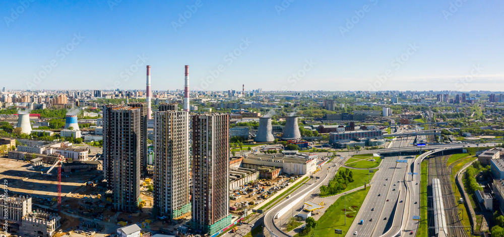 Obraz premium Aerial top view of road junction in Moscow from above, automobile traffic and the old Ugreshskaya railway station in the Moscow industrial zone near the automobile ring highway