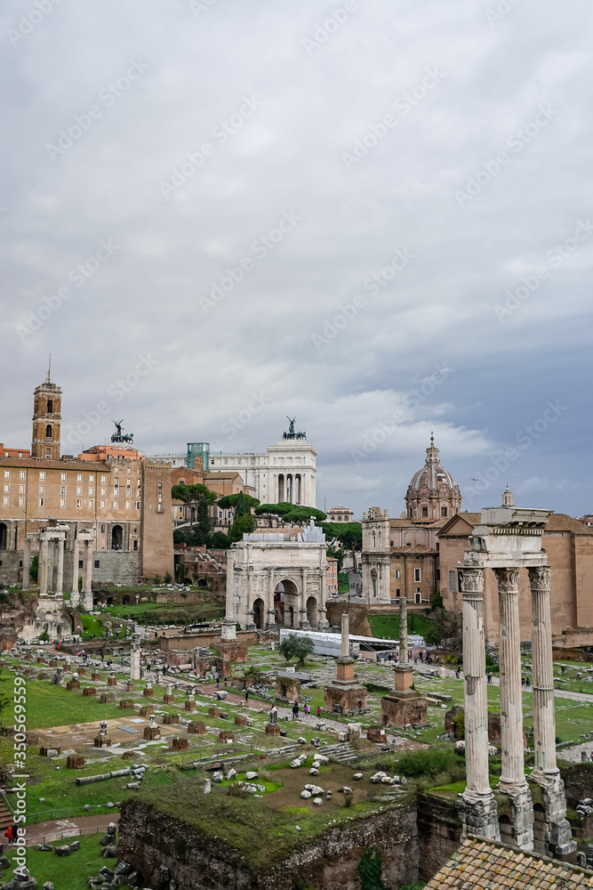 historical landmarks of rome against sky with clouds