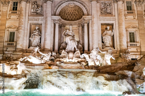 Photography Trevi Fountain with ancient sculptures near water in rome