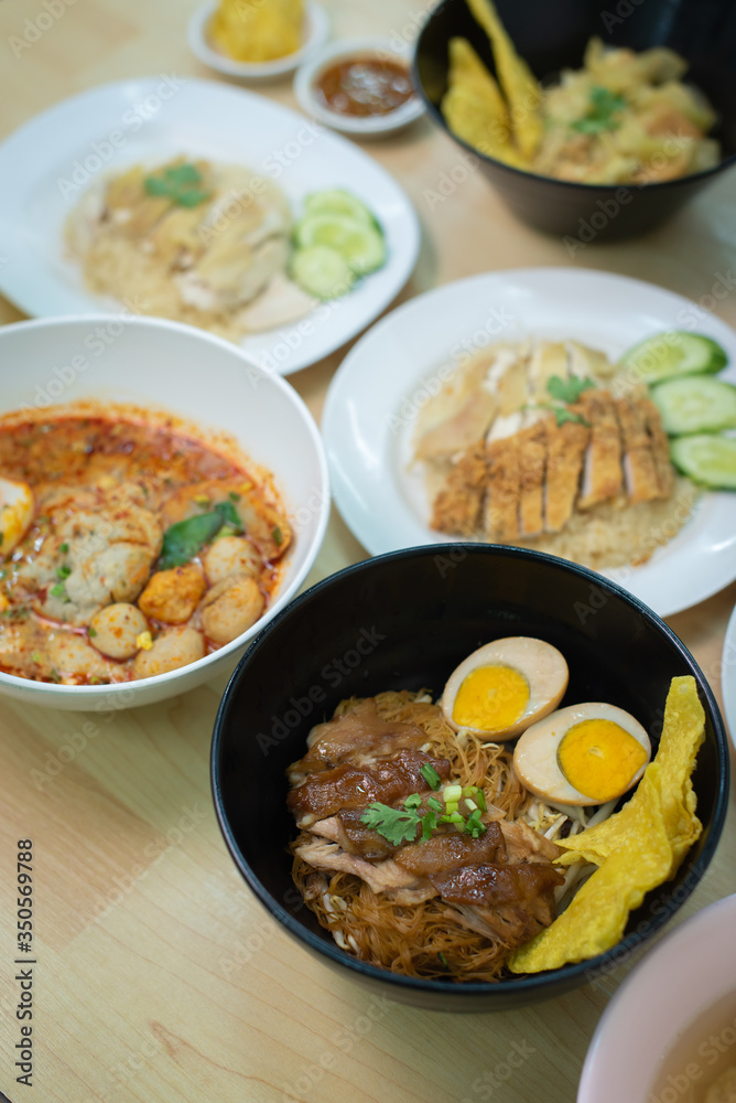 Top view composition with Thai Food. Chicken rice, Stewed pork leg on rice and noodle Top view composition with Thai Food. Chicken rice, Stewed pork leg on rice and noodle