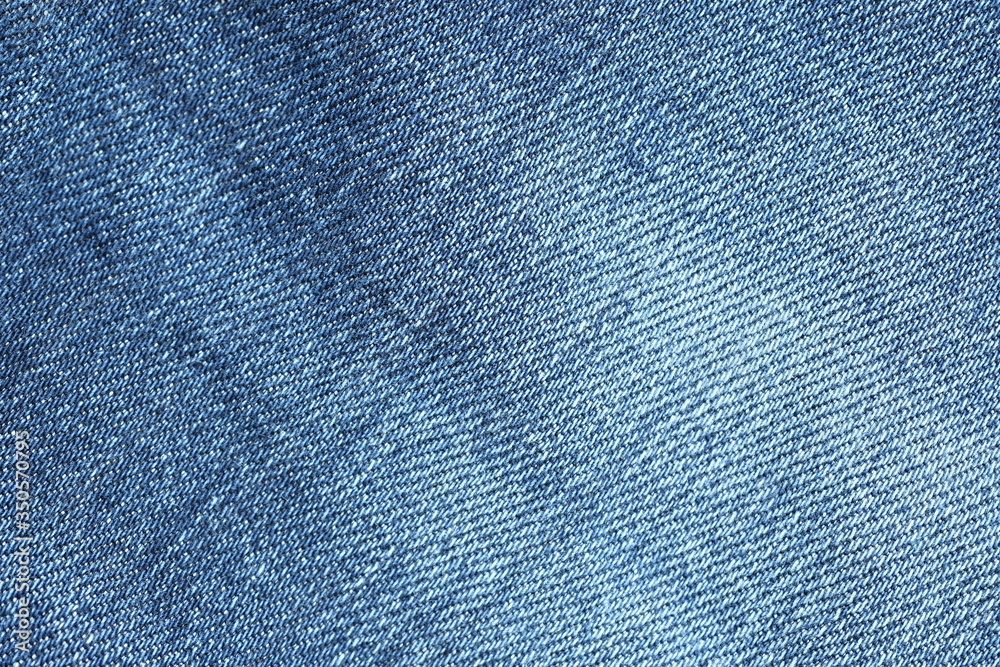 Abstract fabric texture of blue jeans or denim background. Abstract fabric texture of blue jeans or denim background.