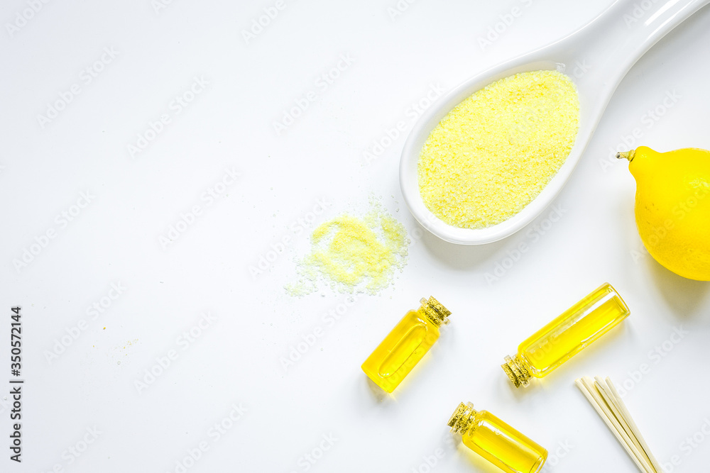 Cosmetic set with seasalt, oils and lemon white background top view mock-up Cosmetic set with seasalt, oils and lemon white background top view mock-up