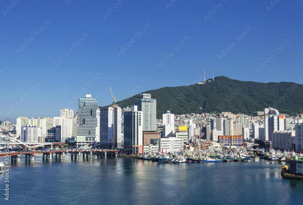 cityscape of Busan with sea and mountain view