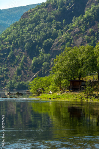 Mountain lake in summer time near Eidfjord, Norway