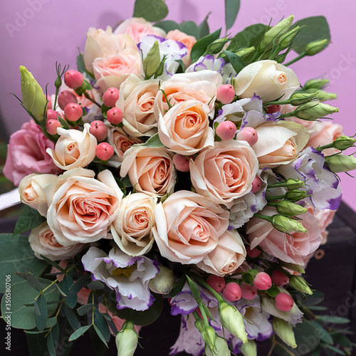 Wedding bouquet of soft pink Bush roses close-up, beautiful bouquet of the bride. © Людмила Селянинова