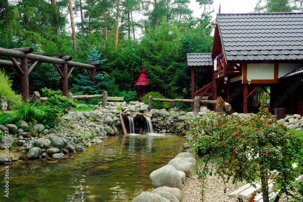 Flowing stream with a waterfall in nature Flowing stream with a waterfall in nature