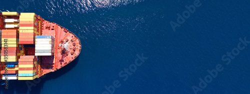 Aerial drone panoramic ultra wide photo of industrial container tanker ship cruising in open ocean deep blue sea   © aerial-drone