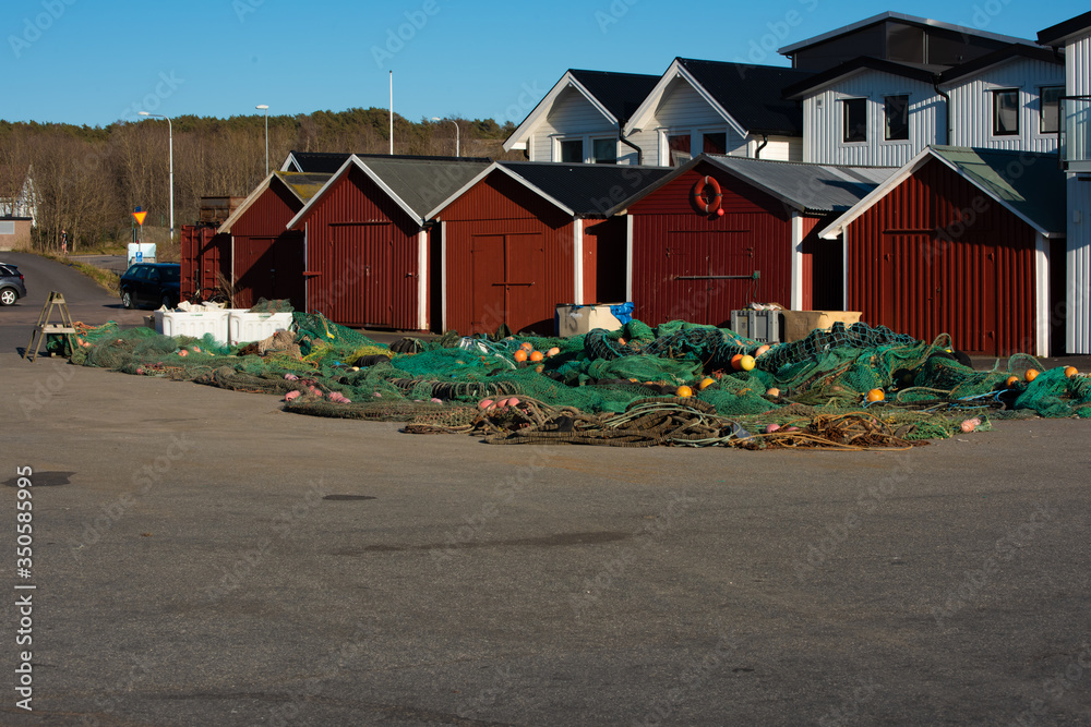 Fishing nets and trawls on the ground. Fishing nets and trawls on the ground.