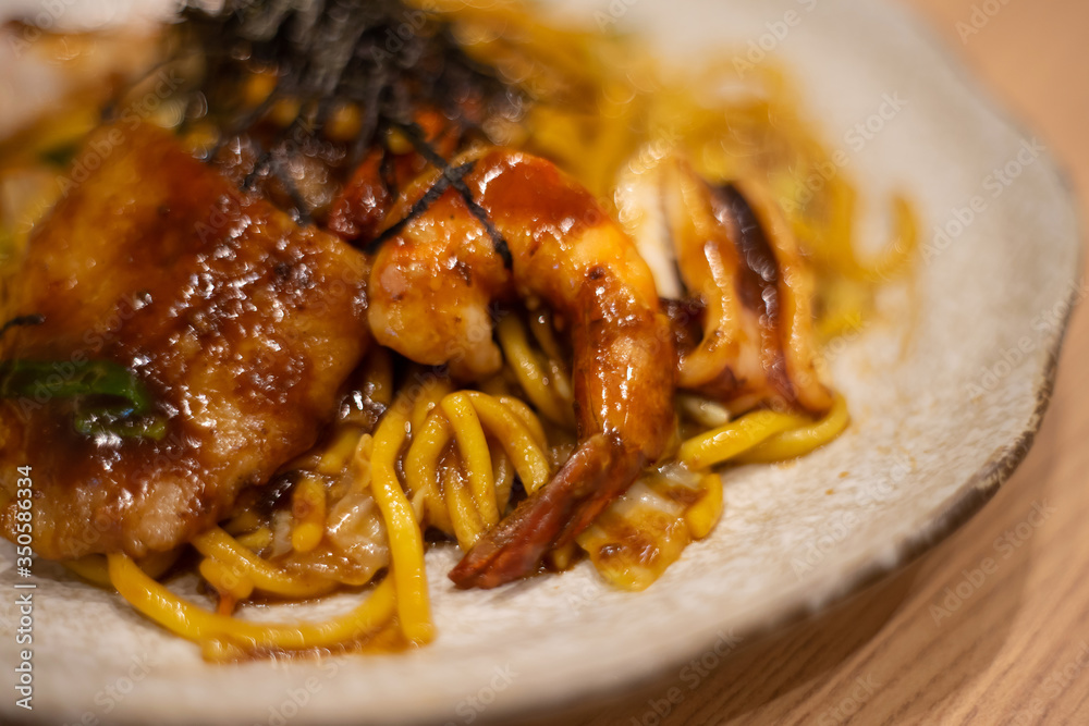 Yakisoba Japanese food of fried noodles with vegetables and shrimp Yakisoba Japanese food of fried noodles with vegetables and shrimp