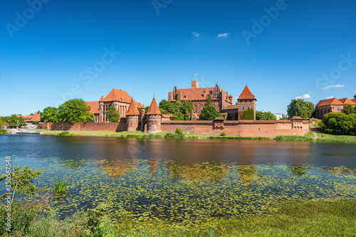Teutonic Castle in Malbork or Marienburg at summer in Poland