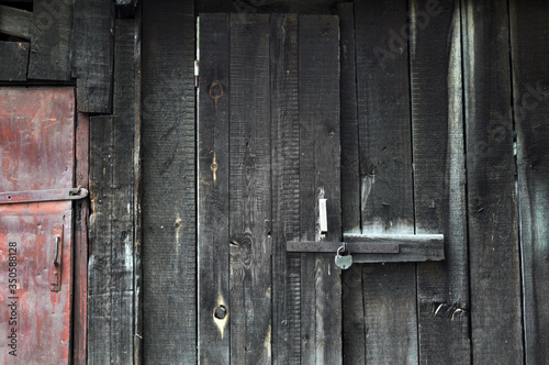 Closed Old vintage wood Door with door lock 
