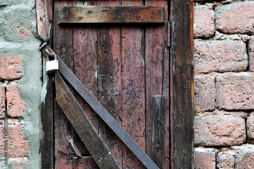 Closed Old vintage wood Door with door lock 