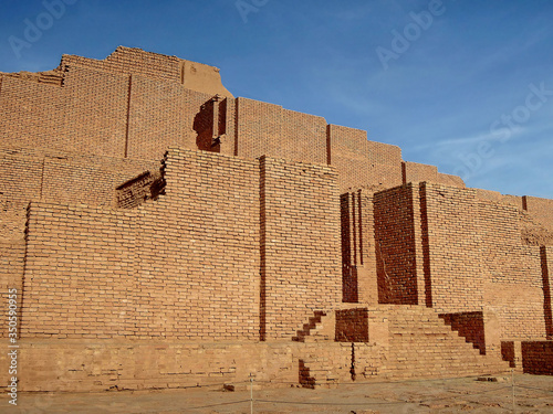 Main facade of ziggurat Chogha Zanbil, near Shush, Iran. It's one of most ancient existent buildings in world, build from mud bricks in 1250 BC. Elamite pyramid is object no.1 in UNESCO List  in Iran