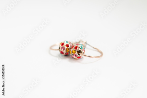 gold earrings with colorful stones