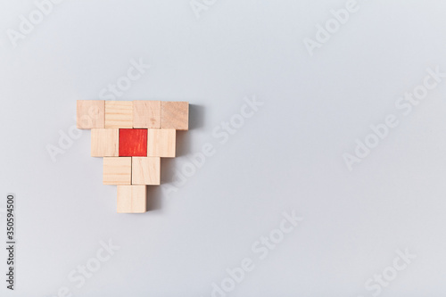Fotografija Empty wooden cube and one red, mockup style, place for text