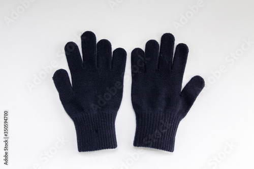 winter woolen gloves on a white background